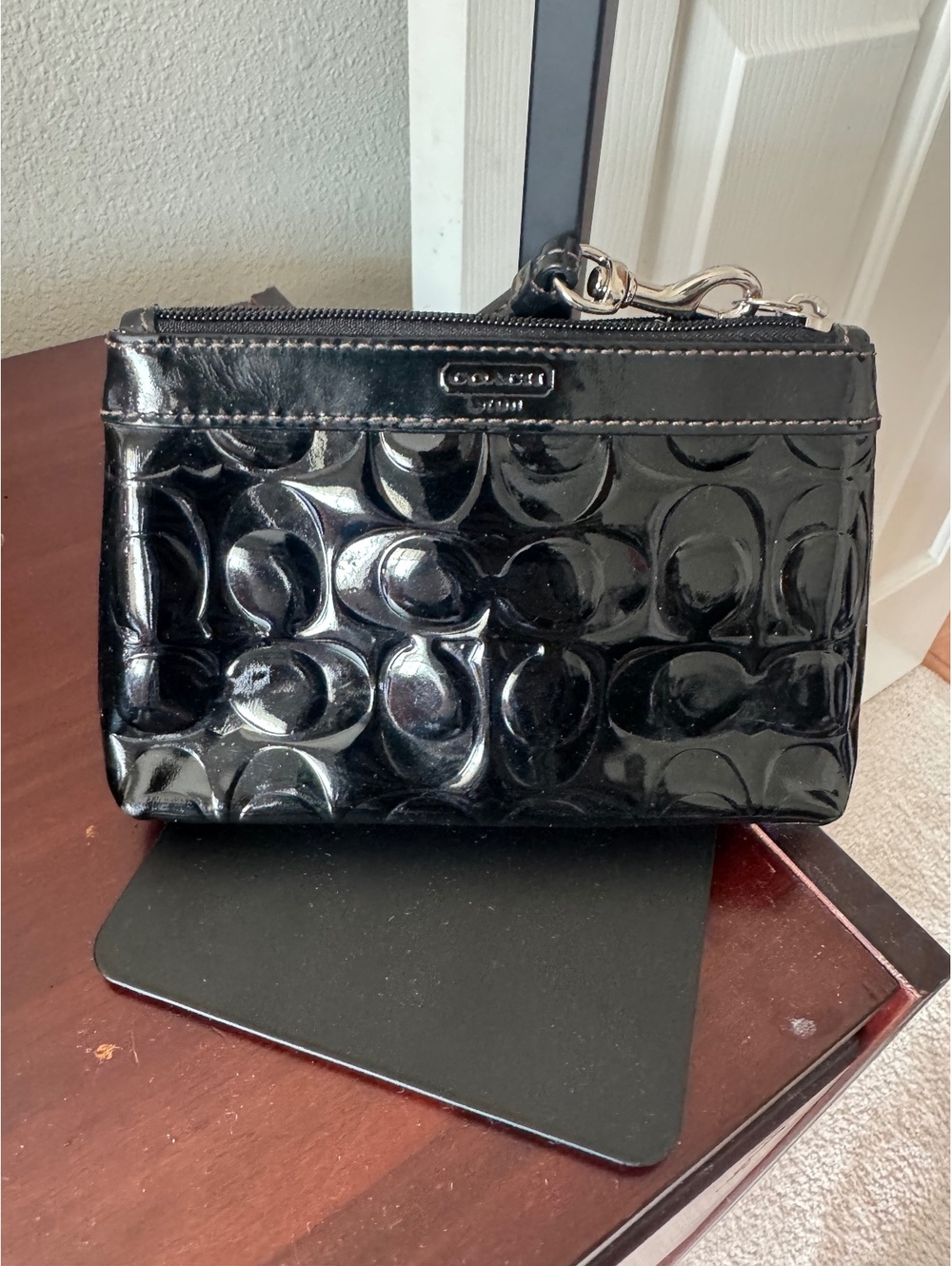 C6.9 coach wristlet black patent leather